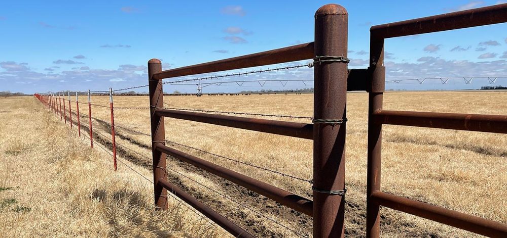 Steel fence on Farmland